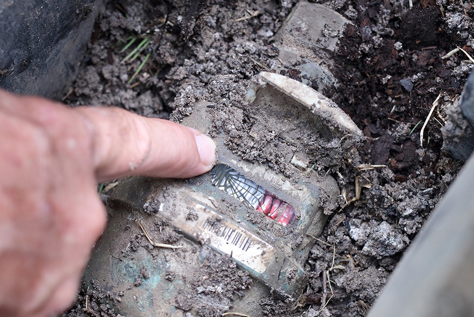 Damaged water meter with cracked glass